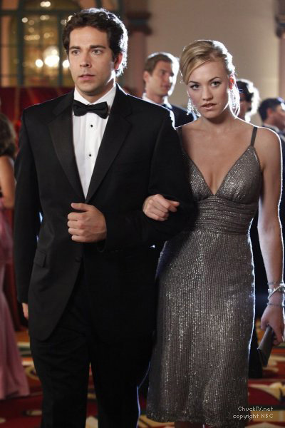 Yvonne Strahovski in silver dress with Chuck Bartowski