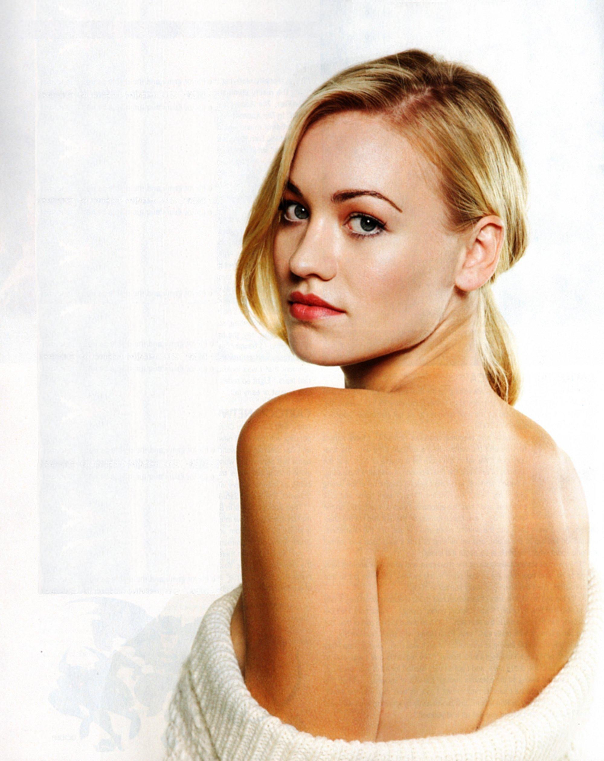 Yvonne Strahovski poses in off the shoulders fuzzy white sweater