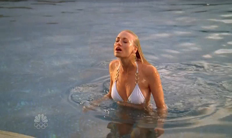 Yvonne Strahovski poses in pool in a white bikini