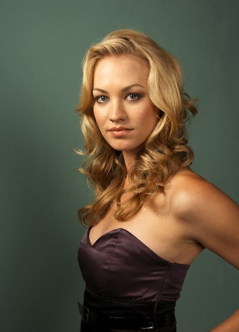 Yvonne Strahovski black strapless dress - green background