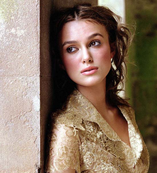 Keira Knightly longing for comapny in cream colored lace top