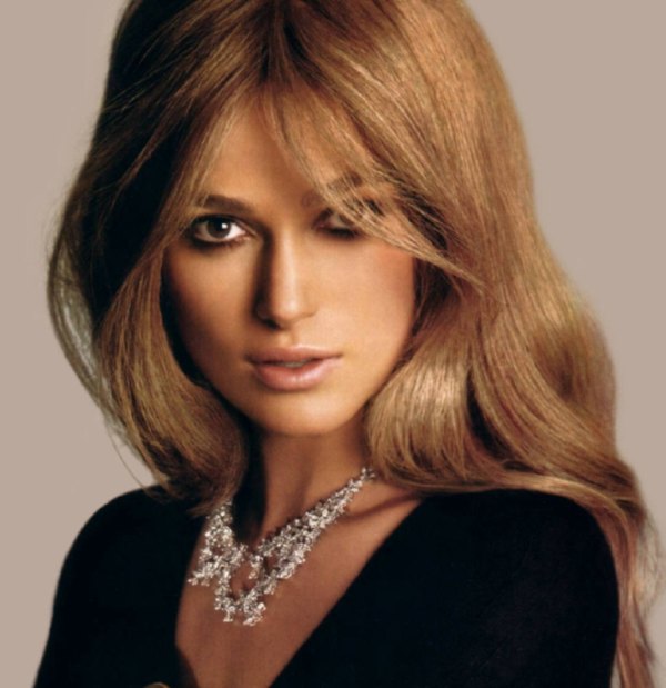 Keira Knightly seems to be channelng Sofia Loren in black top and jewels around her neck