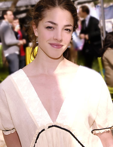 Olivia Thirlby in a low cut white dress