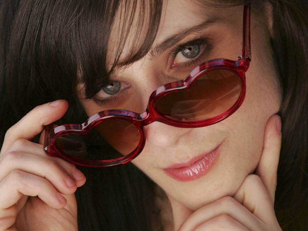Zooey Deschanel - flirty in heart shaped sunglasses