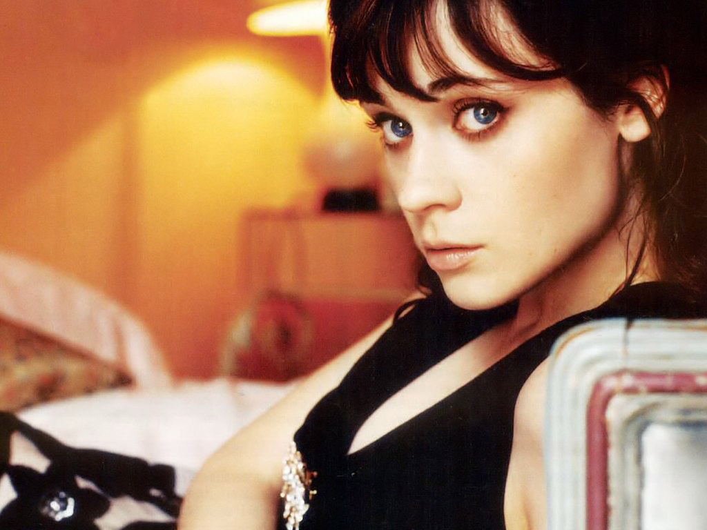 Zooey Deschanel - her blue eyes really show while lounging in a black dress