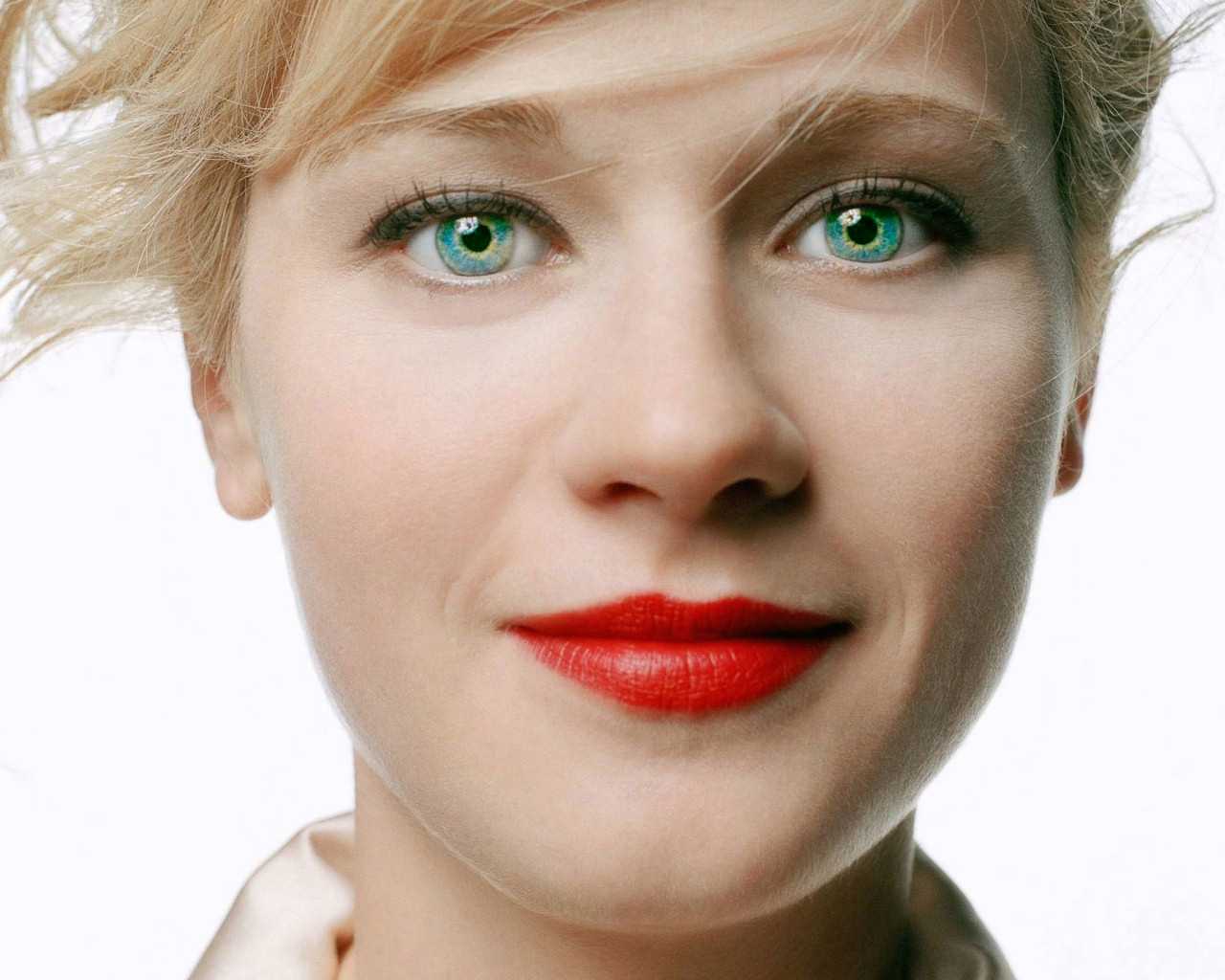 Zooey Deschanel - must be wearing coloured contacts - looks like blue opals