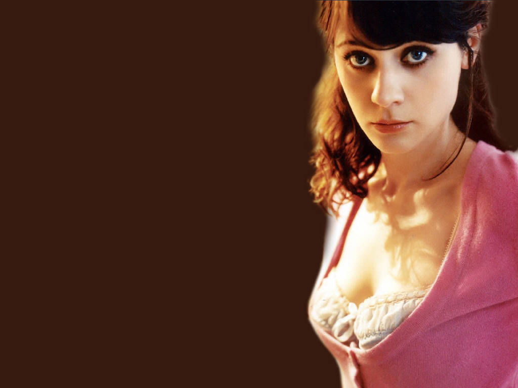 Zooey Deschanel wallpapper - pink sweater with ruffled bodice