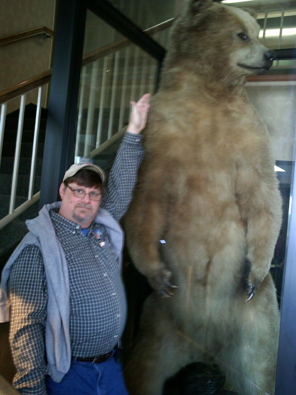Roland Hansen standing next to Alaskan Grizzly